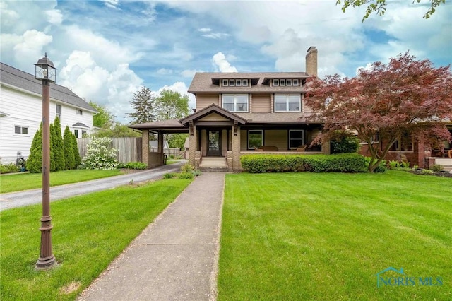 1211 S Main St, Findlay, OH 45840 - view of front of property featuring a porch and a chimney
