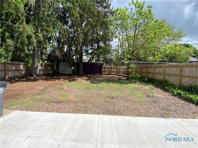 fenced backyard featuring a patio area