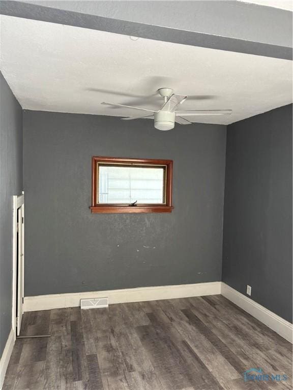 315 Austin St, Toledo, OH 43608 - empty room featuring ceiling fan and wood finished floors