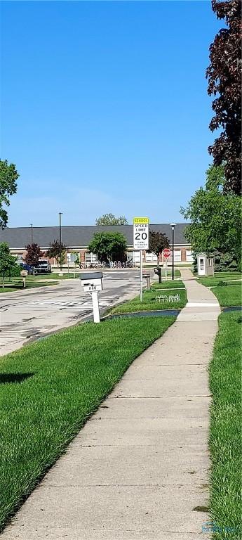 856 Village Pkwy, Waterville, OH 43566 - view of community featuring a lawn