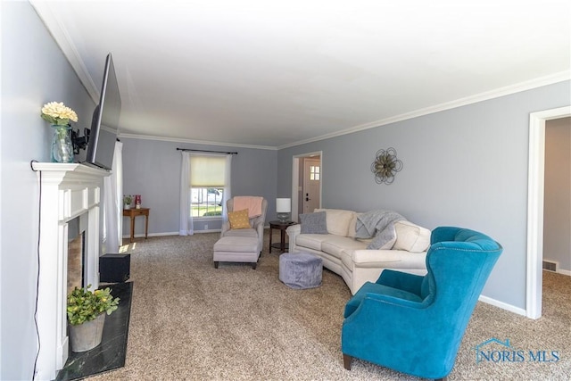 1619 Grant Blvd, Findlay, OH 45840 - carpeted living area featuring ornamental molding, baseboards, and a fireplace with raised hearth