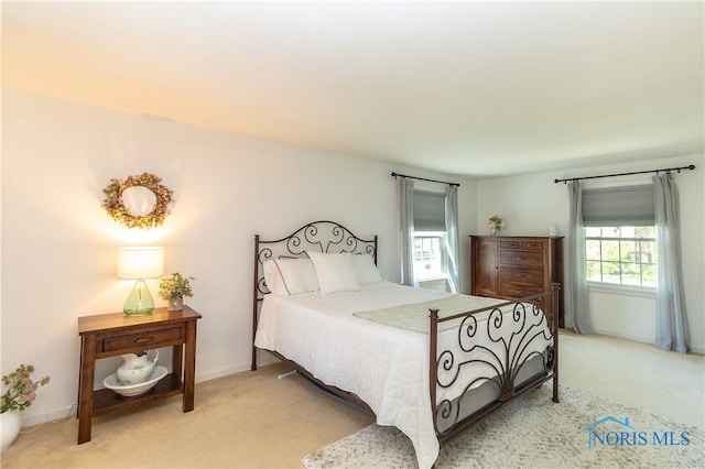 1619 Grant Blvd, Findlay, OH 45840 - bedroom featuring light colored carpet and baseboards