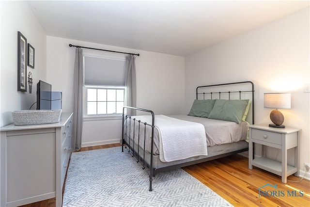 1619 Grant Blvd, Findlay, OH 45840 - bedroom featuring light wood-type flooring and baseboards