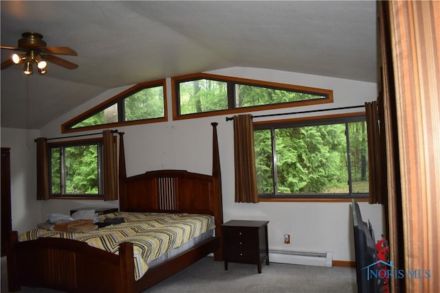 6044 County Road 2, Swanton, OH 43558 - carpeted bedroom with baseboard heating and vaulted ceiling