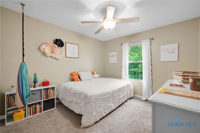 312 Fairmont Dr, Findlay, OH 45840 - carpeted bedroom with ceiling fan and baseboards