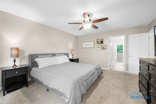 312 Fairmont Dr, Findlay, OH 45840 - bedroom featuring light carpet, baseboards, and ceiling fan