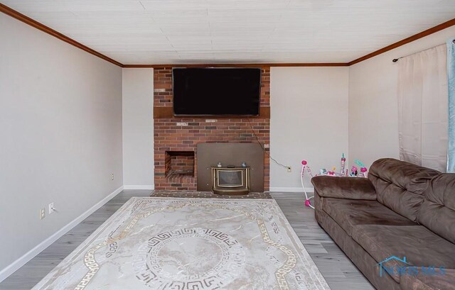 3757 N Mccord Rd, Toledo, OH 43617 - living area with wood finished floors, baseboards, and ornamental molding
