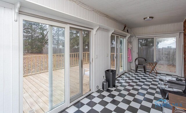 3757 N Mccord Rd, Toledo, OH 43617 - sunroom / solarium featuring tile patterned floors and a deck
