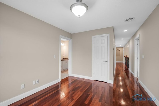 665 Meadowview Dr, Findlay, OH 45840 - spare room featuring wood finished floors, baseboards, and recessed lighting
