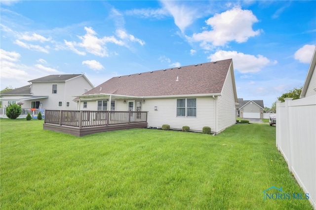 1330 Kennsington Dr, Findlay, OH 45840 - rear view of property featuring a yard, a shingled roof, and a wooden deck
