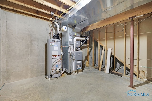 1330 Kennsington Dr, Findlay, OH 45840 - unfinished below grade area featuring water heater and heating unit