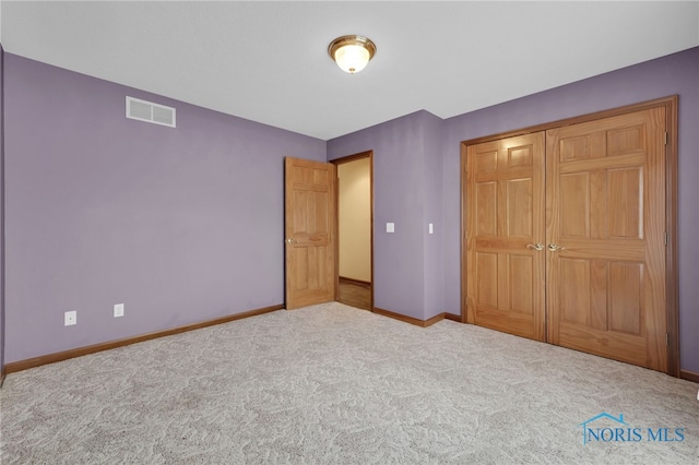 1330 Kennsington Dr, Findlay, OH 45840 - unfurnished bedroom featuring carpet, baseboards, and a closet