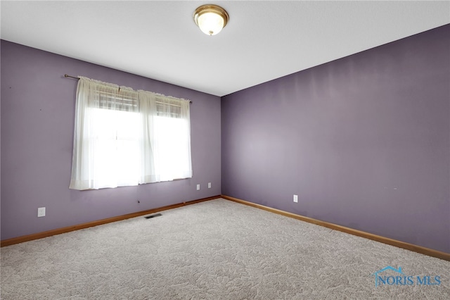 1330 Kennsington Dr, Findlay, OH 45840 - carpeted empty room with baseboards
