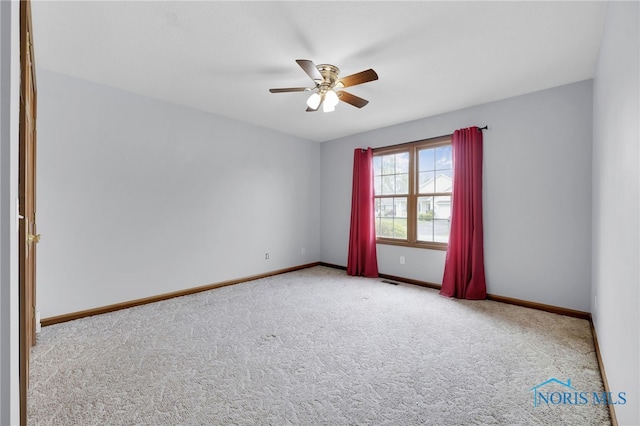 1330 Kennsington Dr, Findlay, OH 45840 - empty room with carpet, ceiling fan, and baseboards