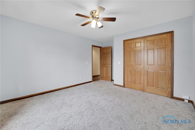 1330 Kennsington Dr, Findlay, OH 45840 - unfurnished bedroom with carpet flooring, baseboards, a closet, and a ceiling fan