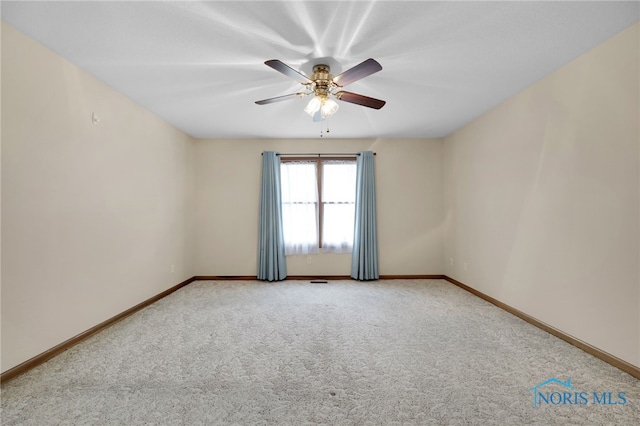 1330 Kennsington Dr, Findlay, OH 45840 - unfurnished room with carpet floors, ceiling fan, and baseboards