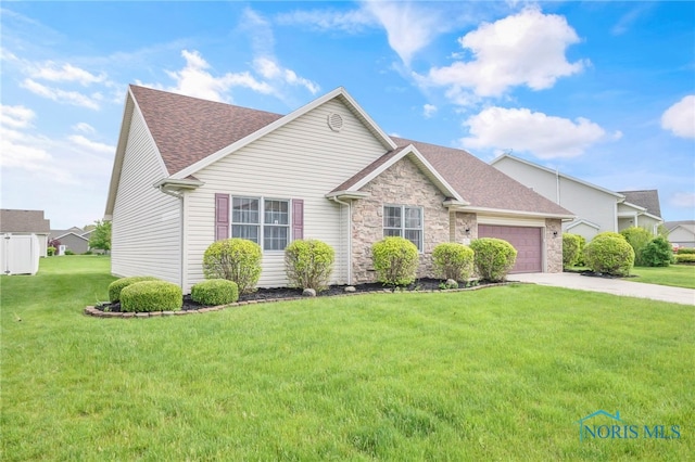 1330 Kennsington Dr, Findlay, OH 45840 - view of front of property featuring driveway, an attached garage, roof with shingles, a front yard, and stone siding