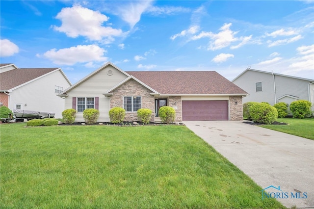 1330 Kennsington Dr, Findlay, OH 45840 - view of front of house featuring an attached garage, concrete driveway, and a front yard
