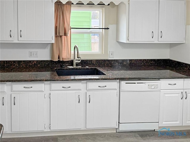 1381 Junior Dr, Maumee, OH 43537 - kitchen with white dishwasher, a sink, white cabinets, and dark stone countertops