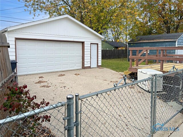 1381 Junior Dr, Maumee, OH 43537 - detached garage featuring fence