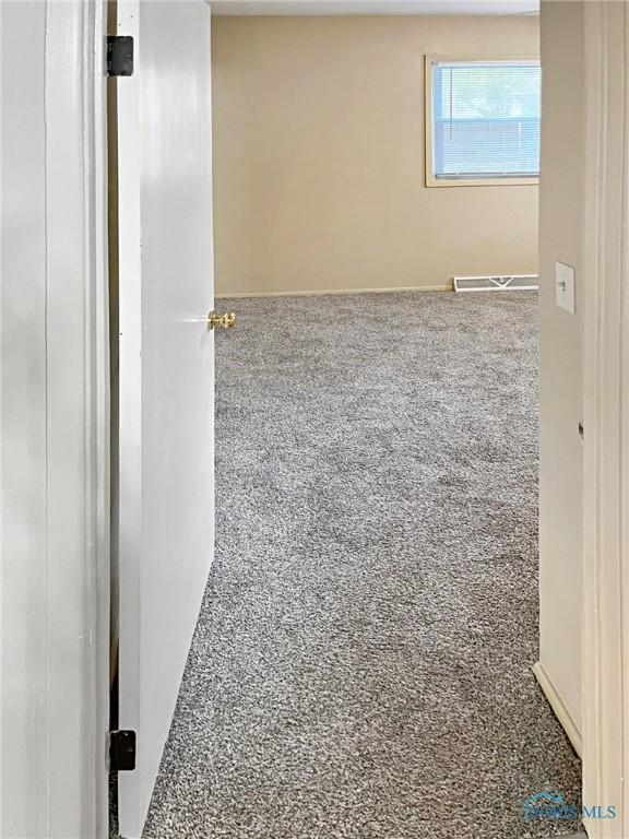 1381 Junior Dr, Maumee, OH 43537 - spare room with speckle patterned floor