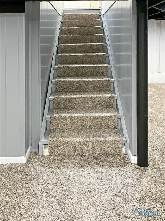 1381 Junior Dr, Maumee, OH 43537 - staircase with baseboards and speckled floor