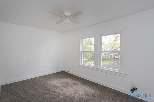 940 Kingston Ave, Toledo, OH 43605 - empty room featuring carpet floors, ceiling fan, and baseboards