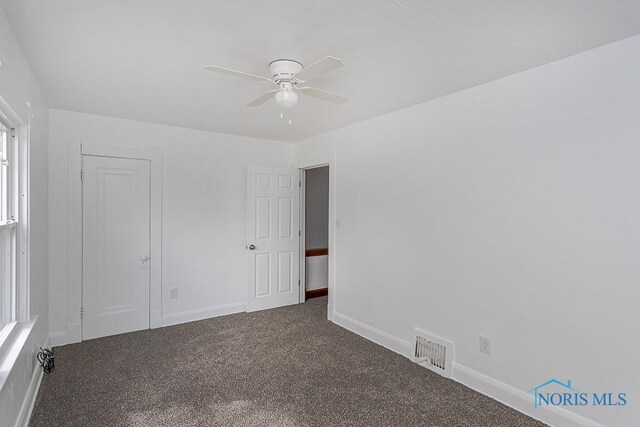 940 Kingston Ave, Toledo, OH 43605 - carpeted empty room featuring ceiling fan and baseboards