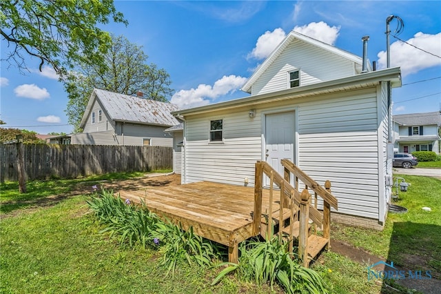221 Poplar St, North Baltimore, OH 45872 - back of property featuring a deck