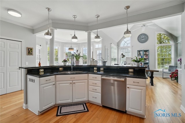 kitchen with dishwasher, a sink, light wood-type flooring, ceiling fan, and ornamental molding