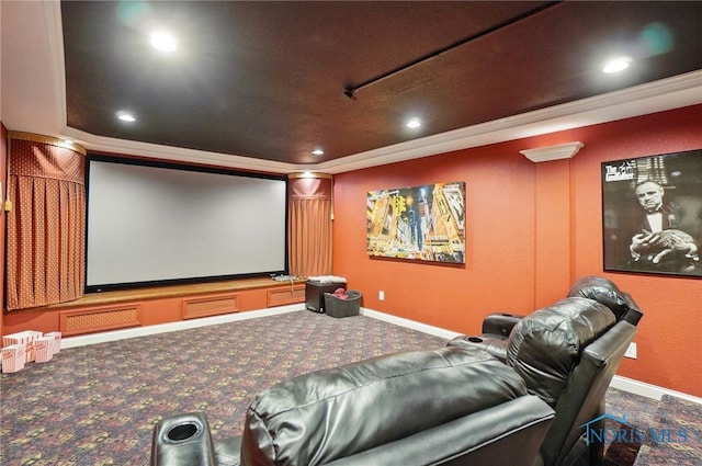 carpeted cinema with ornamental molding, baseboards, recessed lighting, and a tray ceiling