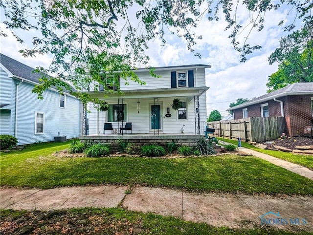 825 Cory St, Fostoria, OH 44830 - view of front of house with a porch