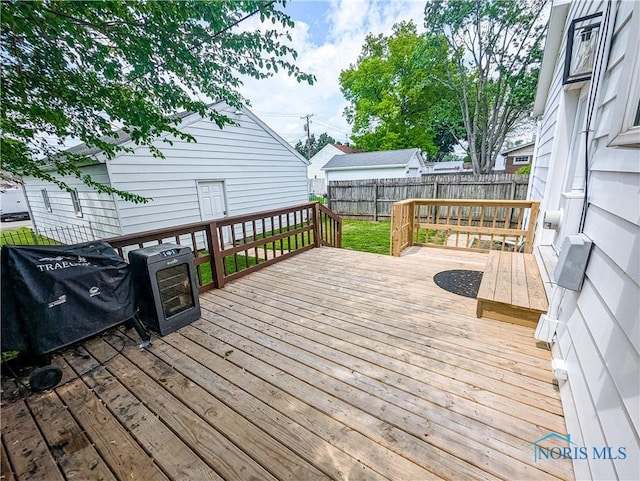 825 Cory St, Fostoria, OH 44830 - wooden deck featuring a fenced backyard