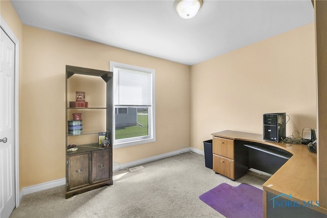 office area with light colored carpet and baseboards