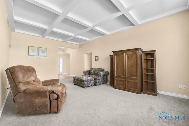 living area featuring coffered ceiling, a chandelier, carpet floors, baseboards, and beam ceiling