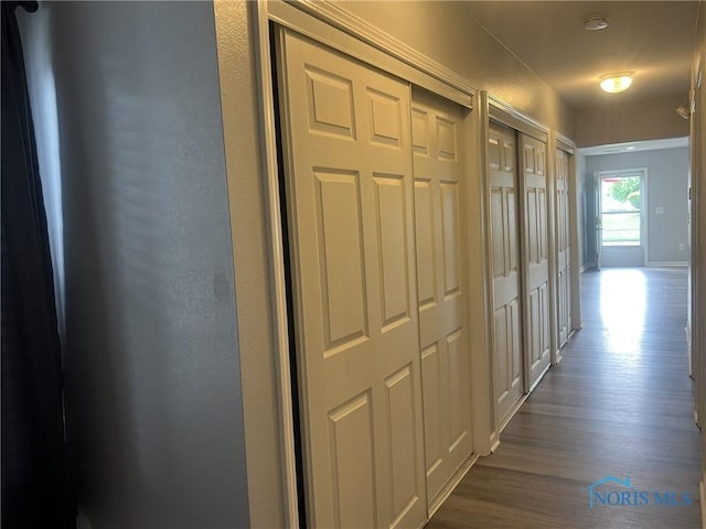 118 N Main St, Bloomdale, OH 44817 - corridor featuring dark wood-style flooring and baseboards