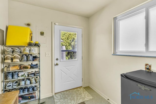 4426 Sheraton Rd, Ottawa Hills, OH 43615 - doorway featuring baseboards and carpet flooring