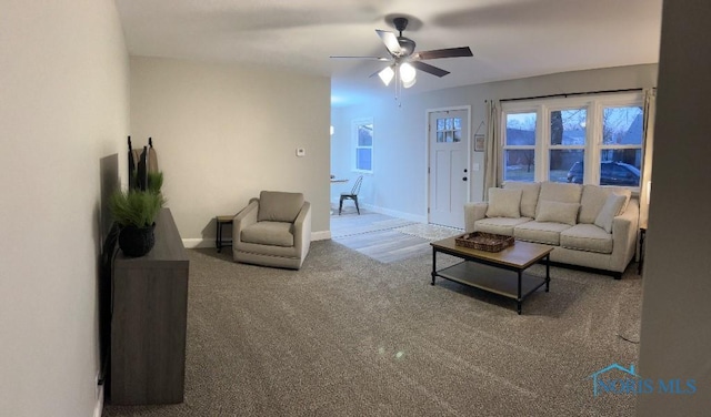 613 W Yeasting St, Gibsonburg, OH 43431 - carpeted living area featuring ceiling fan and baseboards