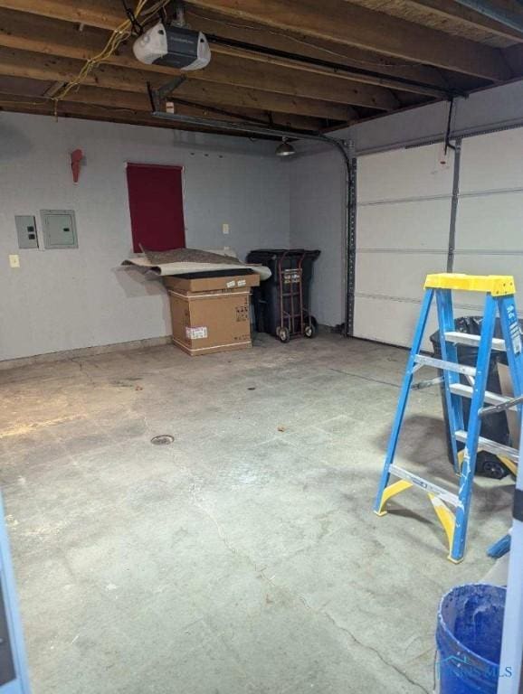 613 W Yeasting St, Gibsonburg, OH 43431 - garage featuring a garage door opener and electric panel