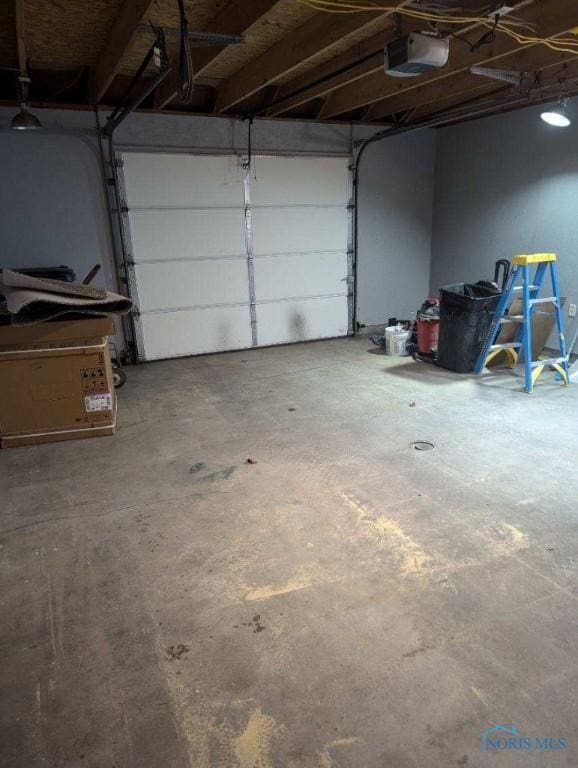 613 W Yeasting St, Gibsonburg, OH 43431 - garage with a garage door opener