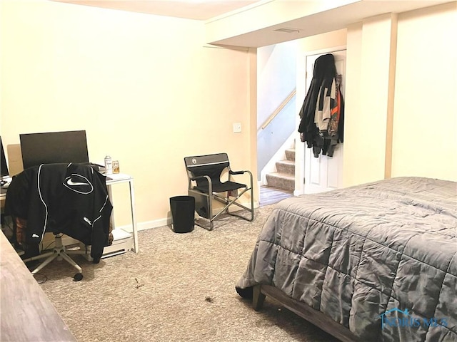 405 W Richards Rd, Toledo, OH 43607 - bedroom with carpet floors, baseboards, and a desk