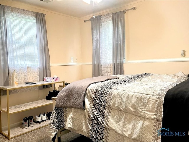 405 W Richards Rd, Toledo, OH 43607 - bedroom featuring carpet flooring and crown molding