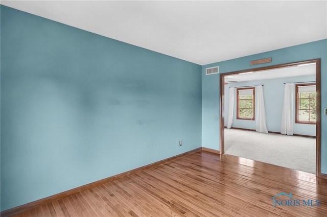 1977 Lexington Dr, Perrysburg, OH 43551 - unfurnished room with baseboards and wood finished floors