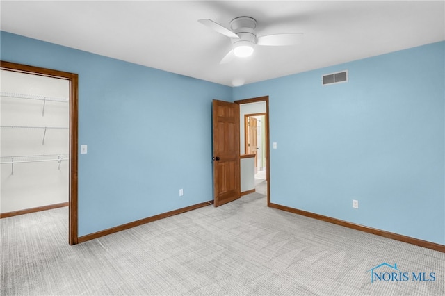 1977 Lexington Dr, Perrysburg, OH 43551 - empty room with light colored carpet, a ceiling fan, and baseboards