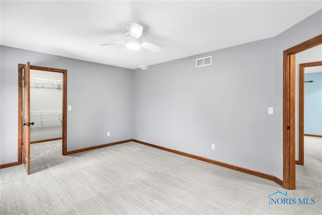 1977 Lexington Dr, Perrysburg, OH 43551 - spare room with ceiling fan, light colored carpet, and baseboards