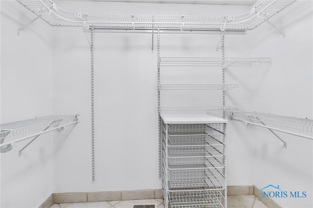 1977 Lexington Dr, Perrysburg, OH 43551 - walk in closet featuring tile patterned flooring