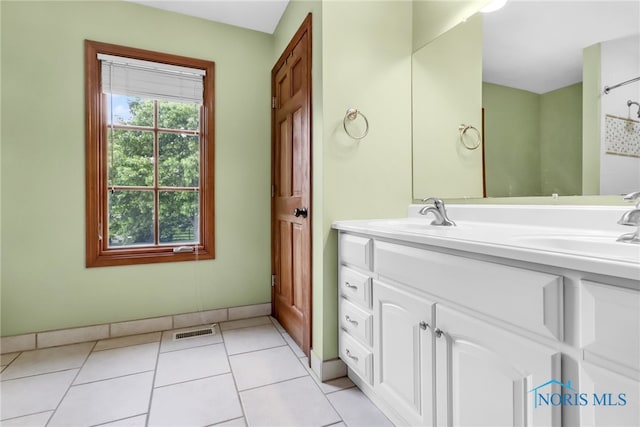 1977 Lexington Dr, Perrysburg, OH 43551 - bathroom featuring double vanity and tile patterned floors