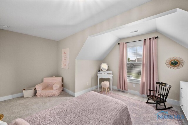 5653 Mallard Pointe Ln, Sylvania, OH 43560 - carpeted bedroom with vaulted ceiling and baseboards