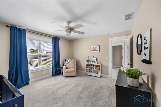 5653 Mallard Pointe Ln, Sylvania, OH 43560 - sitting room featuring ceiling fan, baseboards, and carpet flooring