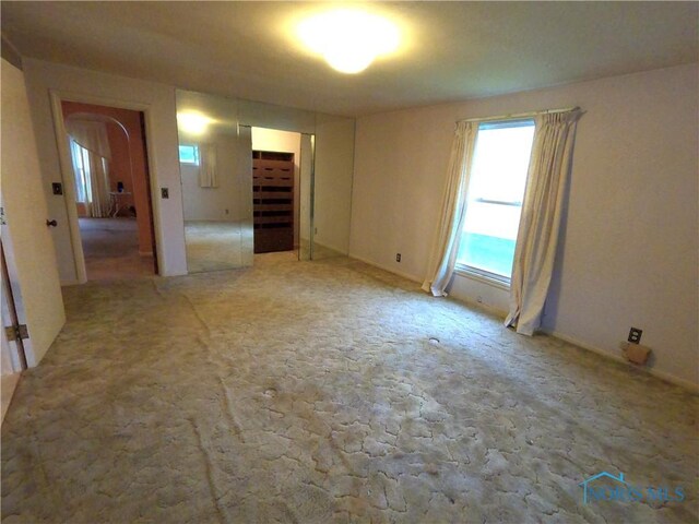 651 Park St, Napoleon, OH 43545 - spare room with carpet floors